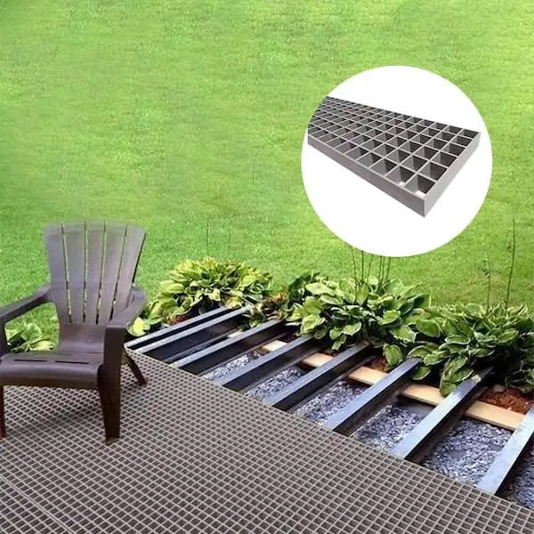 Fiberglass grating walkway panels with slip-resistant surface at manufacturing facility