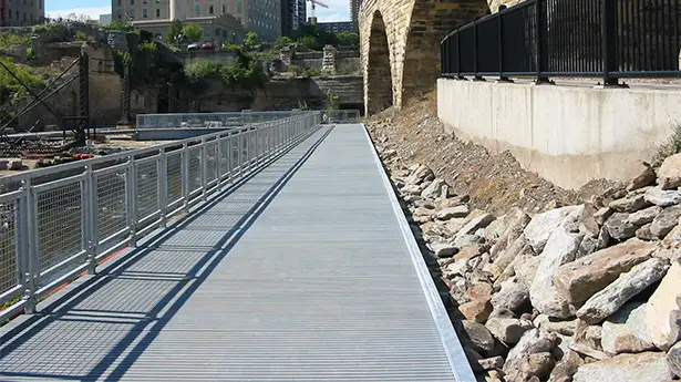 Close-up of anti-slip FRP walkway surface on rooftop solar platform
